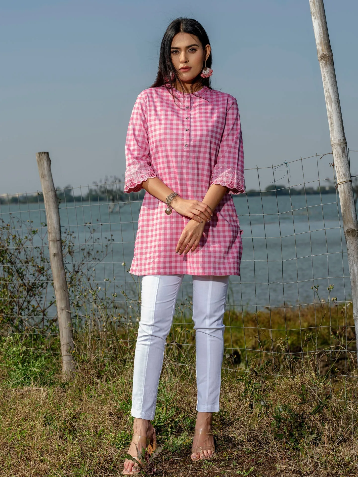 Cotton lycra checks top with cutwork embroidery at sleeves