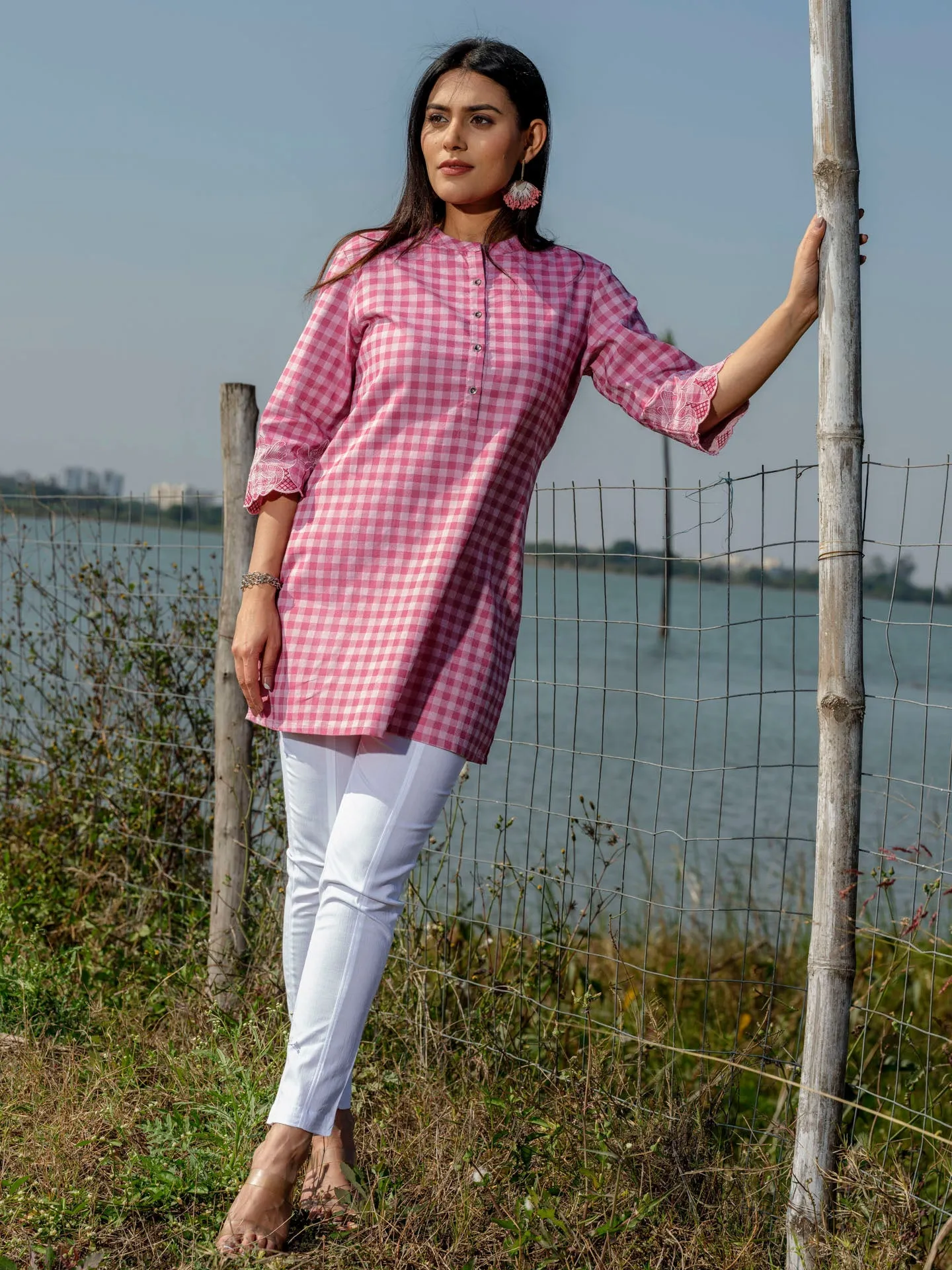 Cotton lycra checks top with cutwork embroidery at sleeves