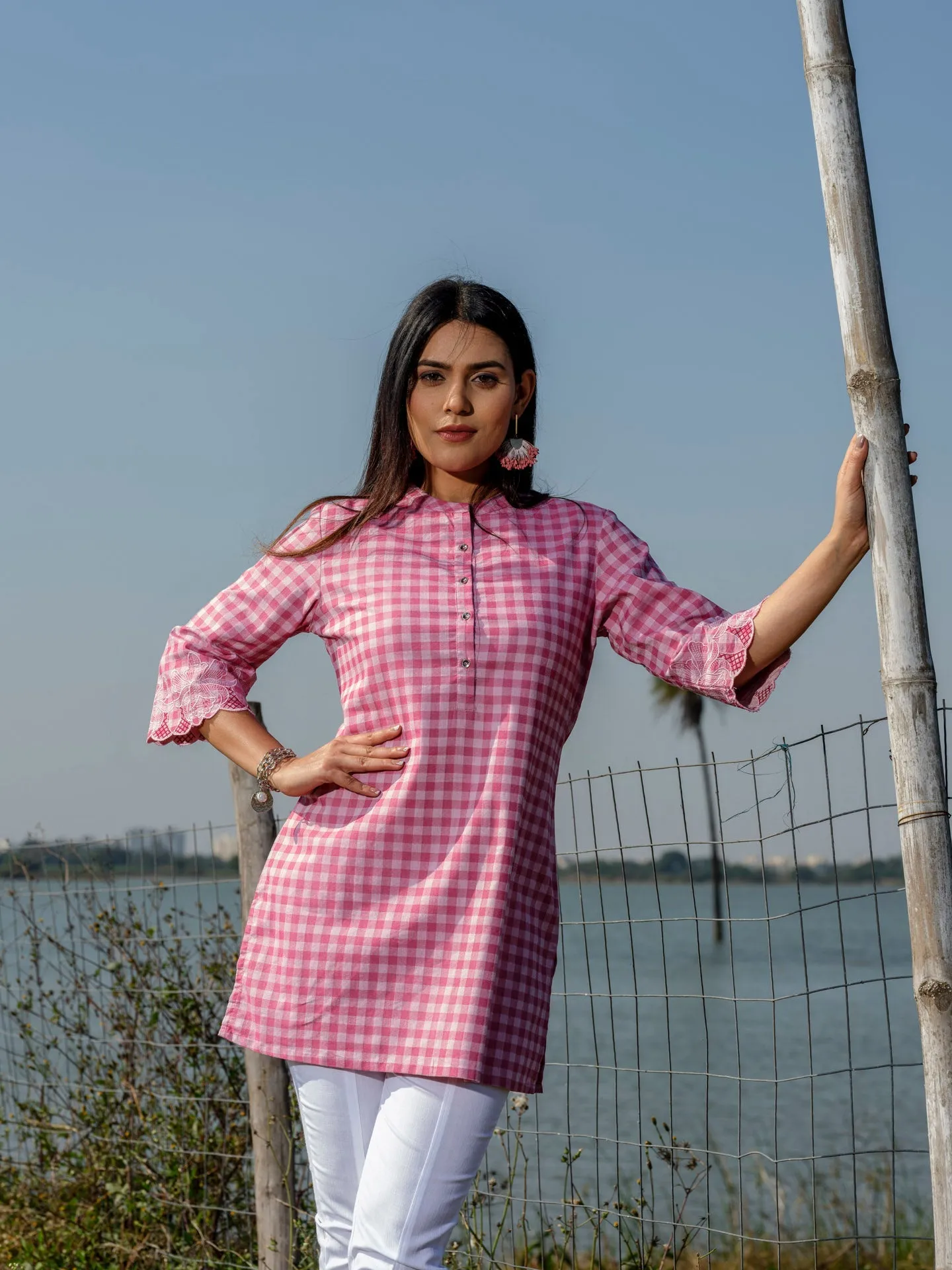 Cotton lycra checks top with cutwork embroidery at sleeves
