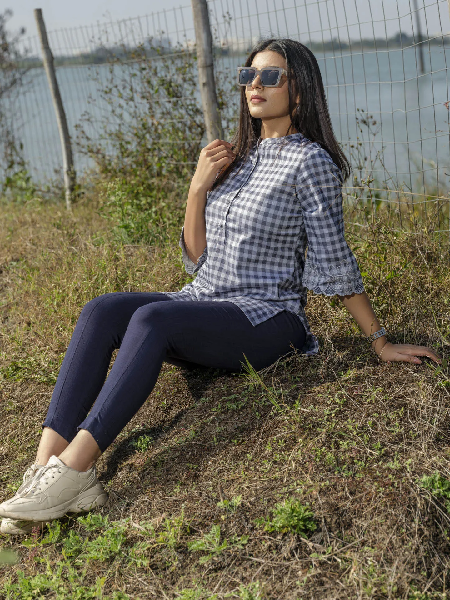 Cotton lycra checks top with cutwork embroidery at sleeves