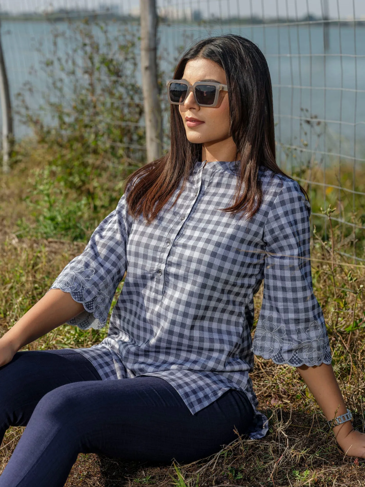 Cotton lycra checks top with cutwork embroidery at sleeves
