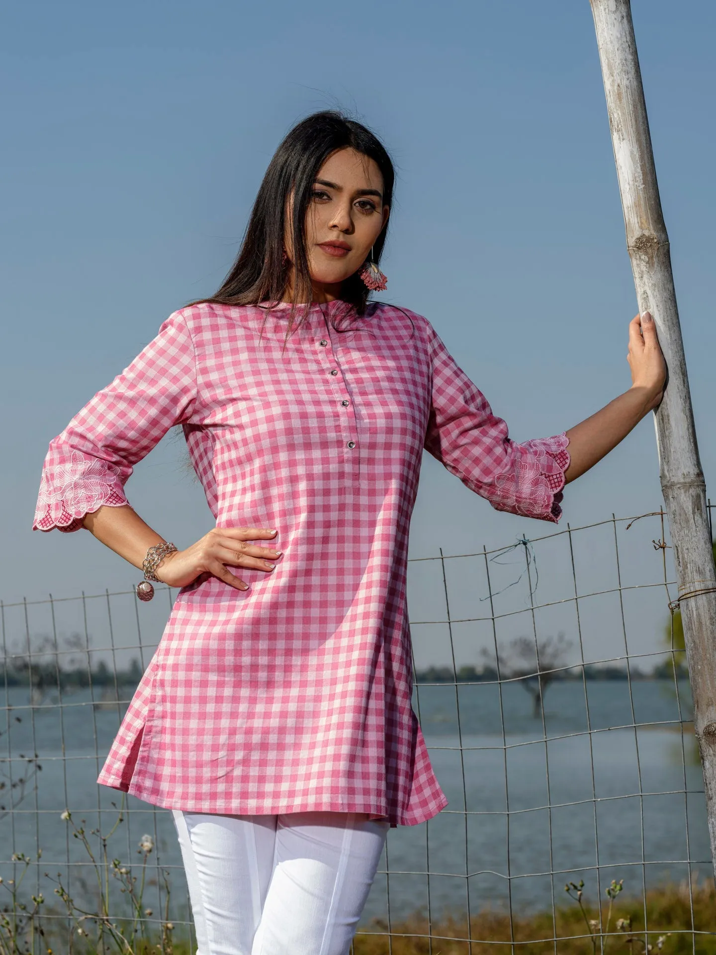 Cotton lycra checks top with cutwork embroidery at sleeves