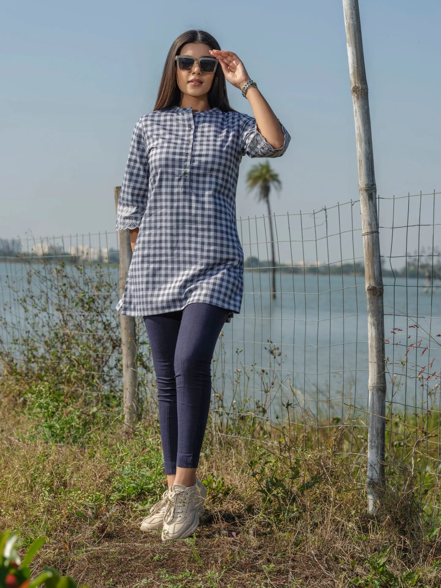 Cotton lycra checks top with cutwork embroidery at sleeves